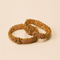Antique Gold-Toned Temple Design Bangles with Ruby &amp; Emerald Stones (Set of 2)